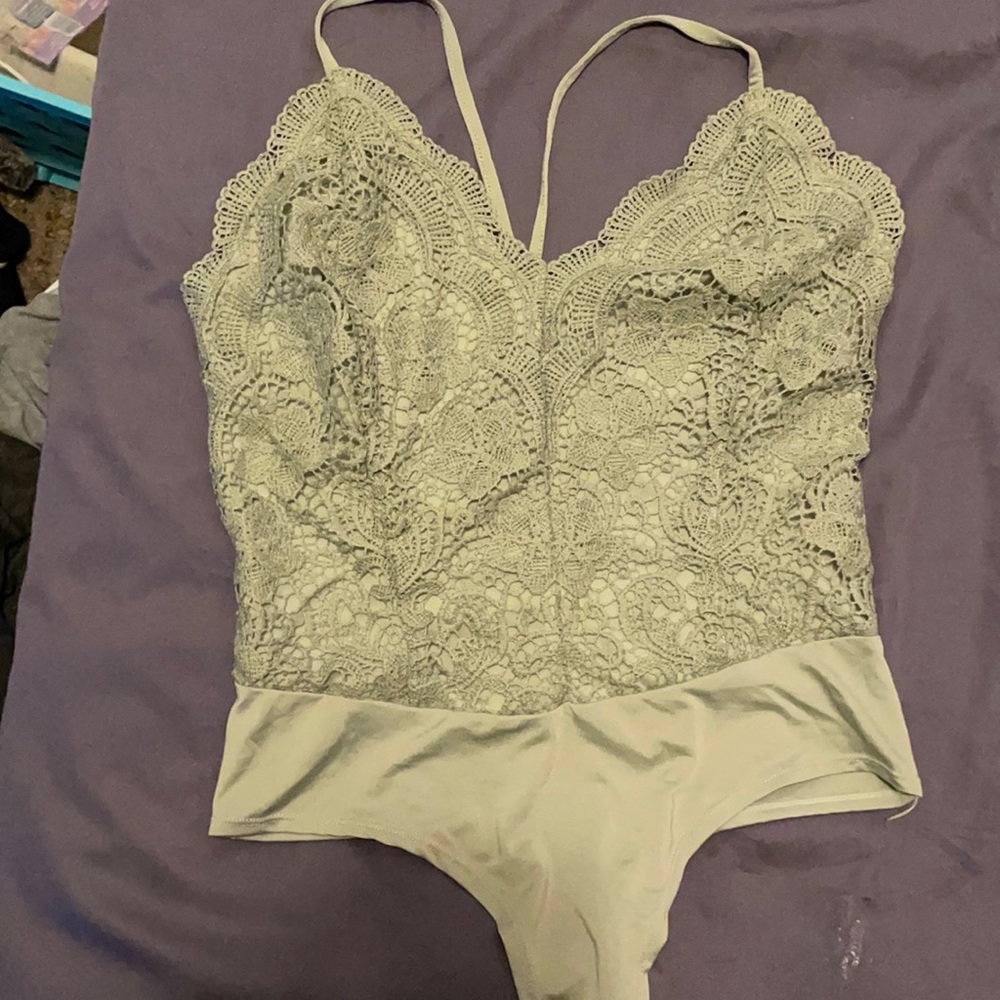 Green lace body suit